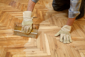 Réparation de parquet sur-mesure autour d’Uccle